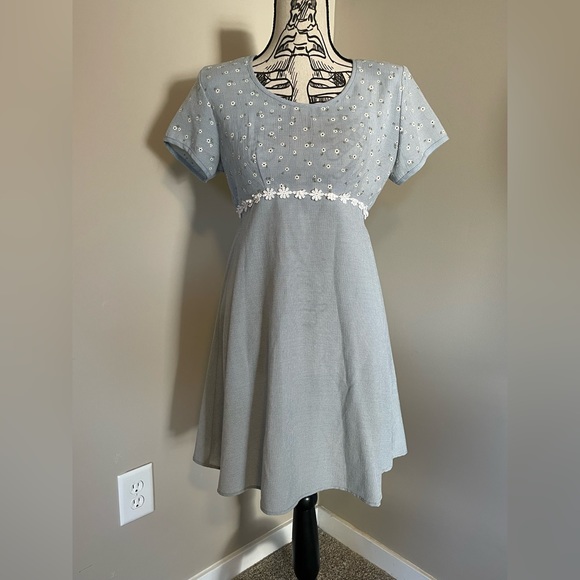 DBY Dresses & Skirts - Light Blue Mini Dress with Embroidered Bodice